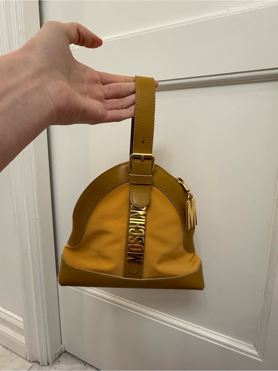 Moschino Handbags - Vintage Moschino Mustard Dome Wristlet with Gold Logo